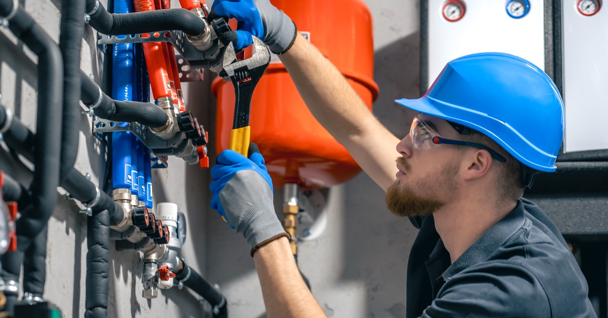 R&F Plumbing Solutions engineer at work in a residential property